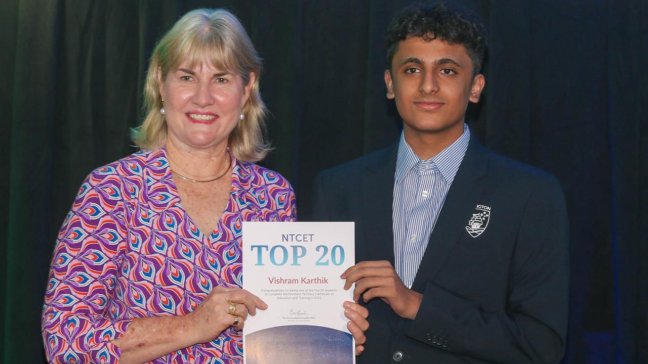 Education Minister Eva Lawler presents Essington School's Vishram Karthik after the announcement of 2022 NTCET Top 20 Year 12 Students and 2022 Top Aboriginal Student at NT Parliament House. Picture: Glenn Campbell