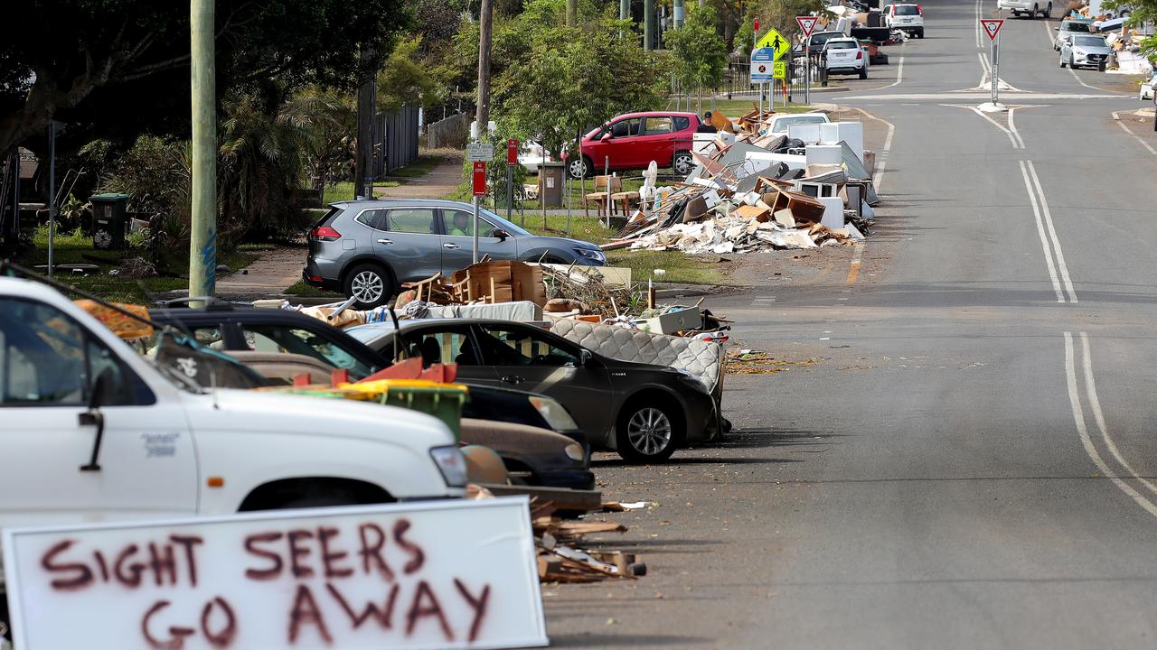 Residents along Diadem St put their damaged furniture and belongings onto the roadside ready for collection. Picture: Toby Zerna