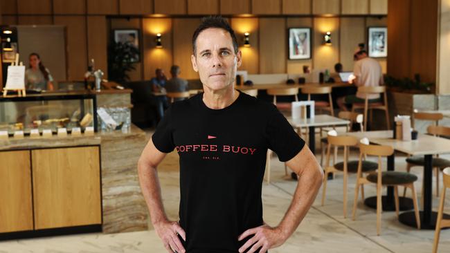 The co-owner of Coffee Buoy cafe Justin Field has been left frustrated by a 11 month wait to have their NBN broadband internet connected, despite being a tenant in the city's number one corporate address. Picture: Brendan Radke