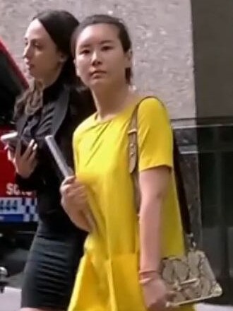 Tsai (front) shortly after her arrest. Picture: Channel 7