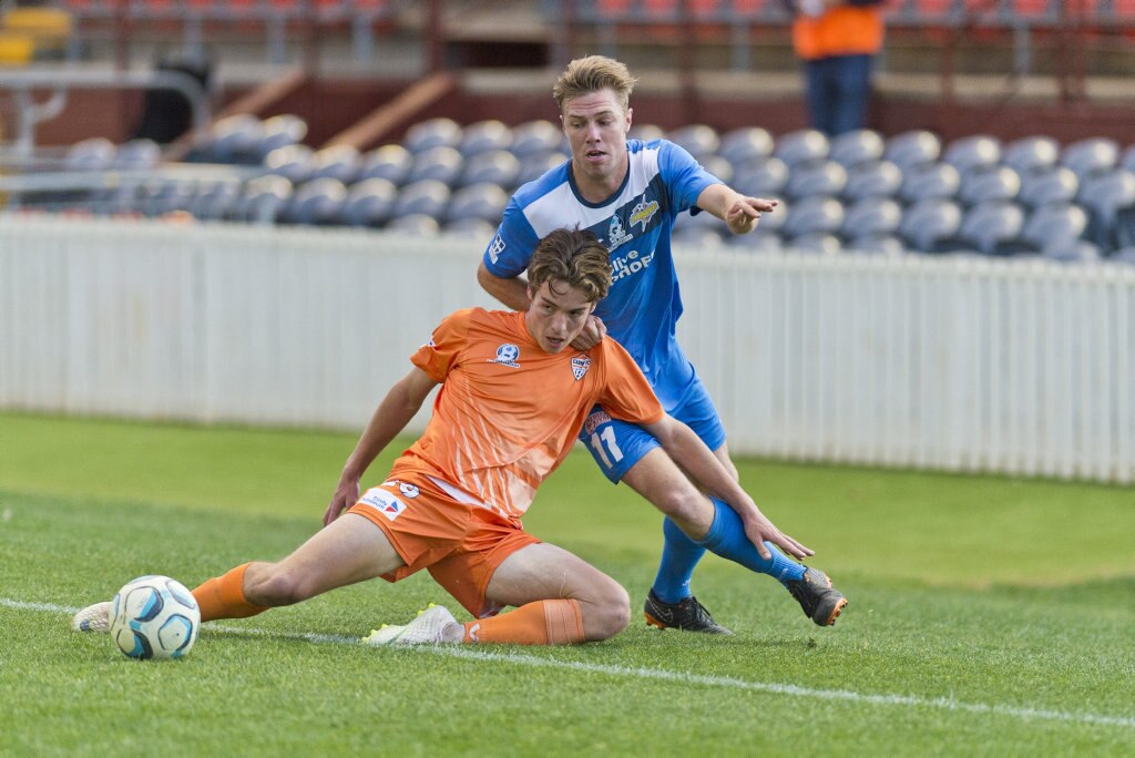 Jacson Riley (left) for Cairns FC and Chris Hatfield of South West Queensland Thunder in NPL Queensland men round 26 football at Clive Berghofer Stadium, Saturday, August 25, 2018. Picture: Kevin Farmer