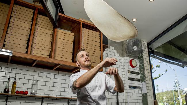 Slice Burleigh has won the Best of the Gold Coast - best pizzeria. Richard Galley prepares a pizza. Picture: Jerad Williams