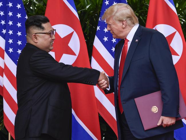 FILE - In this June 12, 2018, file photo, North Korea leader Kim Jong Un, left, and U.S. President Donald Trump shake hands at the conclusion of their meetings at the Capella resort on Sentosa Island in Singapore. When Trump and Kim first met in Singapore in 2018, there was pomp, there was circumstance, but there wasnâ€™t much substance. As they get ready to sit down again in Vietnam on Feb. 27-28, 2019,  thereâ€™s growing pressure that they forge a deal that puts them closer to ending the North Korean nuclear weapons threat (AP Photo/Susan Walsh, Pool, File)