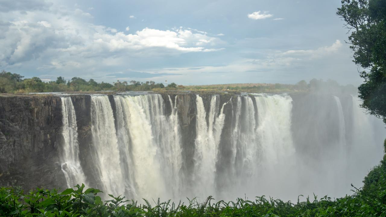 This is how most people recognise Victoria Falls, with water thundering over the cliffs in vast quantities. File photo: Zinyange Auntony/ AFP