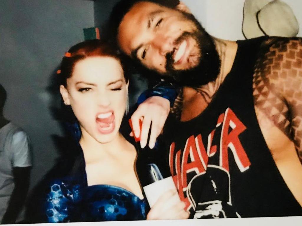 Amber Heard and Jason Momoa pictured at the wrap party for the first Aquaman movie.