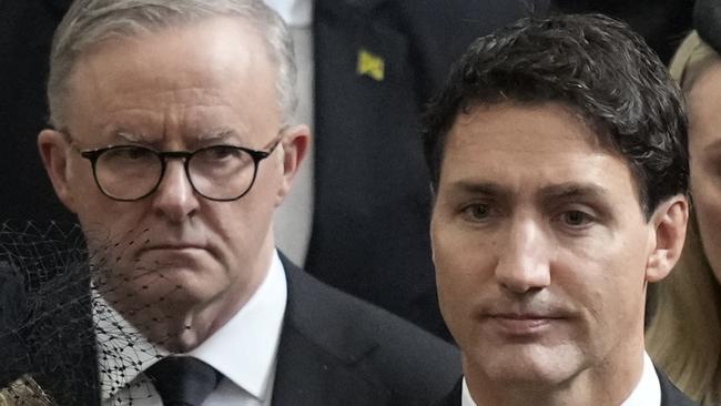 LONDON, ENGLAND - SEPTEMBER 19: Canada's Prime Minister Justin Trudeau, front right, and his wife Sophie, front left, walk with Australia's Prime Minister Anthony Albanese, center, left, as the coffin of Queen Elizabeth II is carried out of Westminster Abbey, after the State Funeral of Queen Elizabeth II at Westminster Abbey on September 19, 2022 in London, England.  Elizabeth Alexandra Mary Windsor was born in Bruton Street, Mayfair, London on 21 April 1926. She married Prince Philip in 1947 and ascended the throne of the United Kingdom and Commonwealth on 6 February 1952 after the death of her Father, King George VI. Queen Elizabeth II died at Balmoral Castle in Scotland on September 8, 2022, and is succeeded by her eldest son, King Charles III. (Photo by Frank Augstein - WPA Pool/Getty Images)