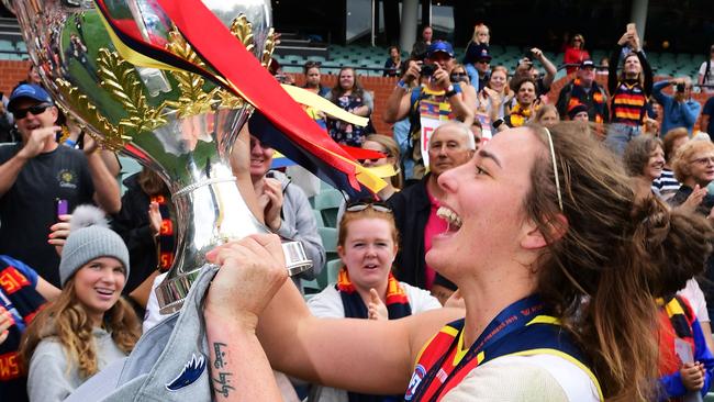 SA’s cross code star Jenna McCormick parades the Adelaide Crows Premiership Cup in March. (Photo by Mark Brake/Getty Images)