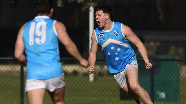 Nicholas Darling of Monash Blues celebrates a goal against Ormond. Photo: Hamish Blair