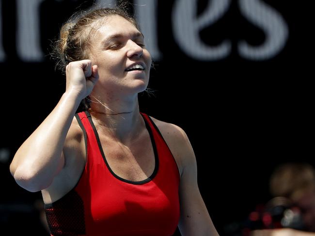 I’ve done it: the pure relief as Romania's Simona Halep realises she’s through to the next round. Picture: AP