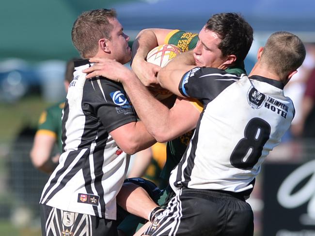 (L-R) Matt White and Kiel Shephard aim up in defence. Picture: Ian Svegovic