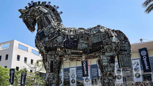 A Trojan horse dilemma: is generative AI a risk or an opportunity? A Trojan horse made of electronic circuit boards and OpenAI banners outside the Tel Aviv campus. Photo: AFP