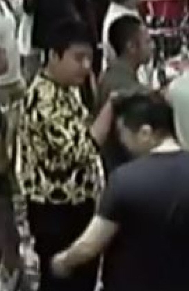 Junchi Ma in the yellow and black top.