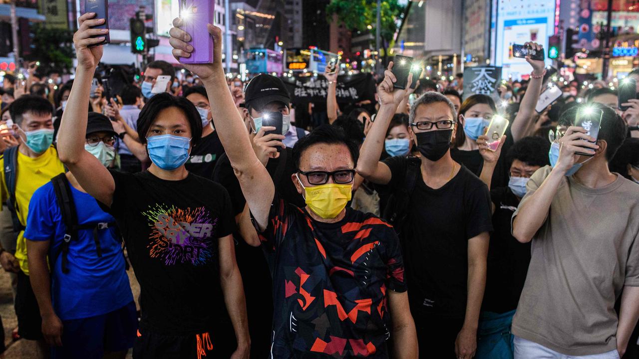 Pro-democracy activists in Hong Kong on Friday night. Picture: Anthony Wallace/AFP