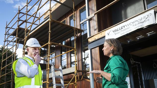 Tasmanian Premier Peter Gutwein and Valley Workshop company director and Builder Penelope Haley on a building site at Howrah. Picture: Chris Kidd