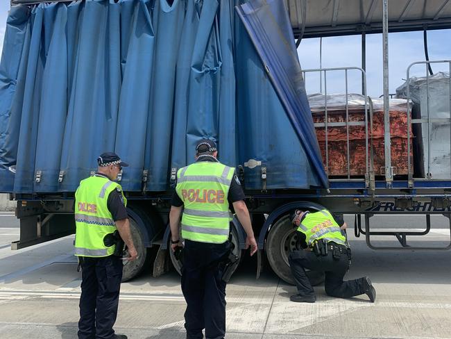 Police disecover an unsecured load while conducting random checks.