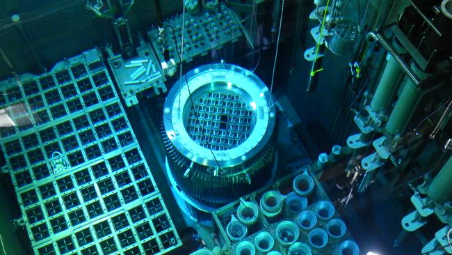 Spent fuel rods being unloaded in the reactor service pool at the Lucas Heights Reactor in Sydney, which is used for research and medical purposes.