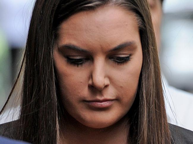 Kim Duthie, the "St Kilda School girl", attends a Victorian Supreme Court hearing of a submission on a book by former AFL player and agent Ricky Nixon, that potentially defames the notorious "St Kilda School girl", in Melbourne, on Tuesday, Nov. 24, 2015. (AAP Image/Joe Castro) NO ARCHIVING