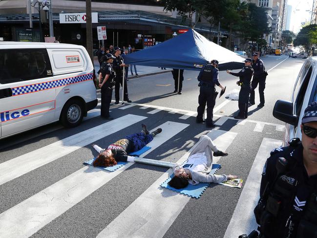 Protesters on a zebra crossing in Brisbane’s CBD. Picture: Liam Kidston.