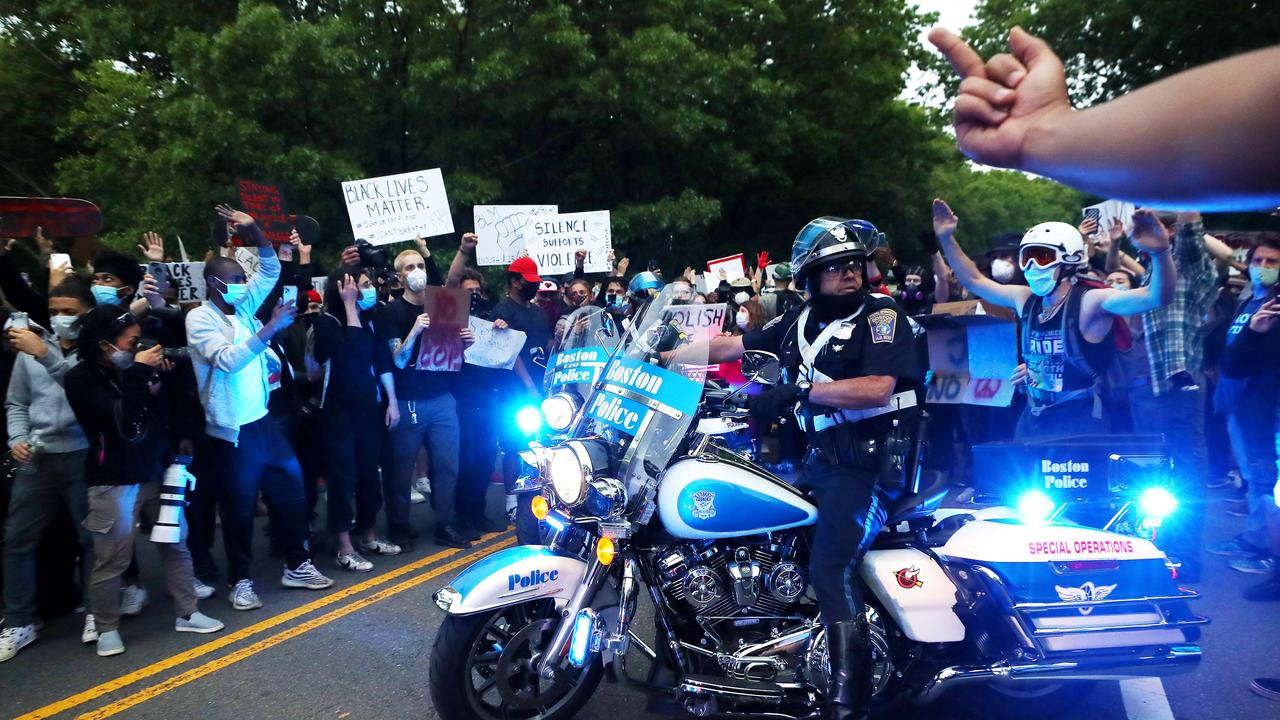 Demonstrators surround a police officer at the conclusion of a protest in Boston, Massachusetts. Picture: Maddie Meyer/Getty Images/AFP