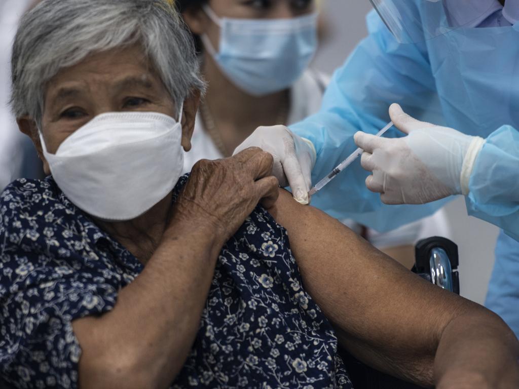 Thailand has started administering AstraZeneca's COVID-19 shot for people who had already been given a dose of the Chinese-developed Sinovac. The plan to mix the shots came as the delta variant of the virus rips through Southeast Asia, leading many countries in the region to report record figures over the last few weeks. According to local reports, a Thai study revealed that over 600 medical workers who had been vaccinated with a two-shot regime of the Sinovac vaccine had contracted the virus, raising doubts about its long-term efficacy. Picture: Sirachai Arunrugstichai/Getty Images