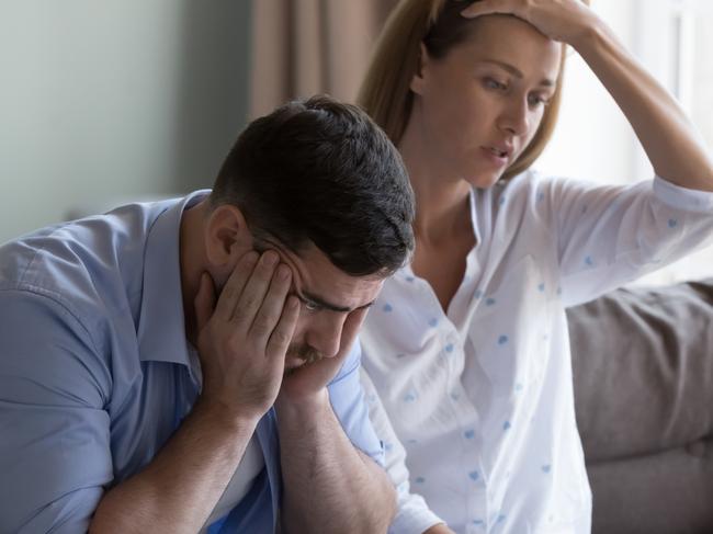 Stressed spouses manage family finances, analyze expenses, check savings and budget, looks disappointed due to mortgage arrears, unpaid utility bills, debt notice. Lack of money, high utility concept