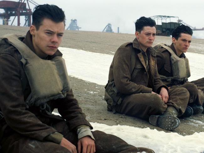 This image released by Warner Bros. Pictures shows Harry Styles, from left, Aneurin Barnard and Fionn Whitehead in a scene from "Dunkirk." Styles, 23, who gained fame with One Direction and recently launched his solo career, plays a British soldier in Christopher Nolanâ€™s suspense-thriller about the evacuation of hundreds of thousands of Allied soldiers from Dunkirk, France, in May and June of 1940. (Warner Bros Pictures via AP)