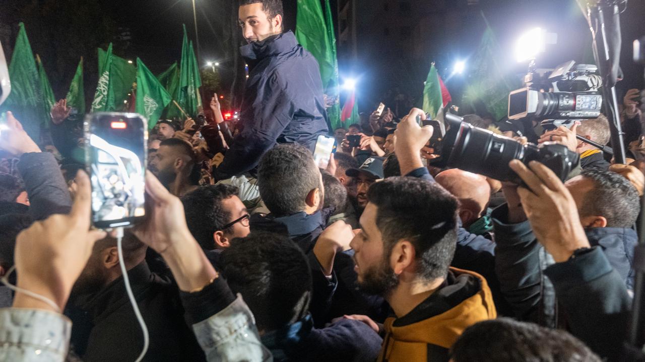 Freed Palestinian prisoners are reunited with loved ones after being released from Israeli prion on November 30, 2023 in Ramallah, West Bank. Photo: Spencer Platt/Getty Images