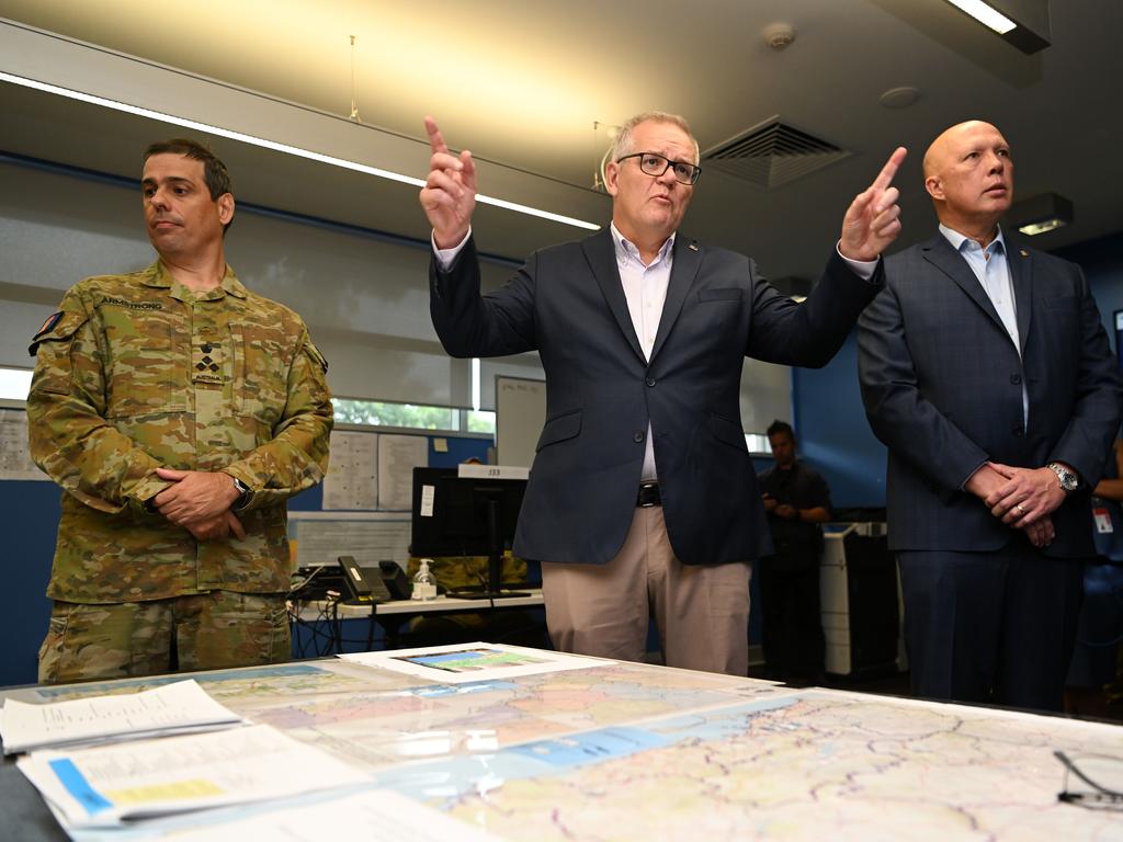 Prime Minister Scott Morrison (centre) and Defence Minister Peter Dutton meet members of the ADF.