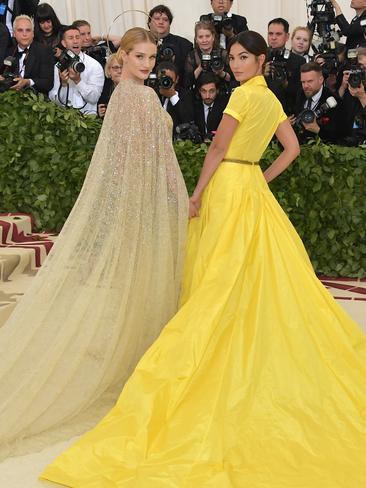 Rosie Huntington-Whiteley and Lily Aldridge, both in Ralph Lauren, attend the 2018 Met Gala in New York City. Picture: Getty
