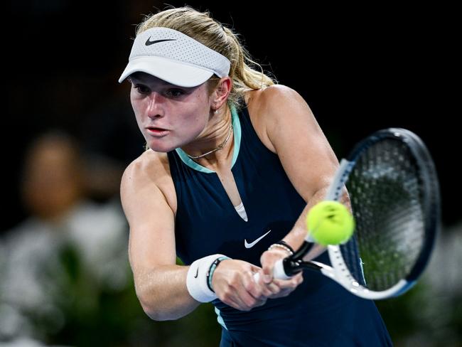 ADELAIDE, AUSTRALIA - JANUARY 08: Emerson Jones of Australia  plays a backhand   in her match against Daria Kasatkina  during day three of the 2025 Adelaide International at Memorial Drive on January 08, 2025 in Adelaide, Australia. (Photo by Mark Brake/Getty Images)