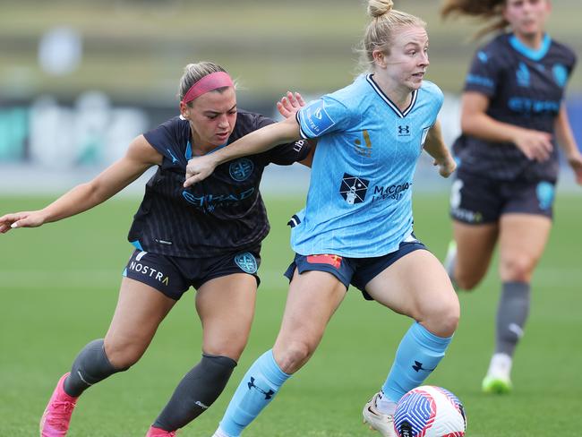 SYDNEY, AUSTRALIA - NOVEMBER 26: Jordan Thompson of Sydney FC is challenged by Julia Grosso of Melbourne City during the A-League Women round six match between Sydney FC and Melbourne City at Sydney Olympic Park Athletic Centre, on November 26, 2023, in Sydney, Australia. (Photo by Matt King/Getty Images)