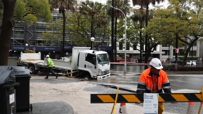 Council workers were on scene trying to extract the truck in Double Bay. Picture: John Grainger