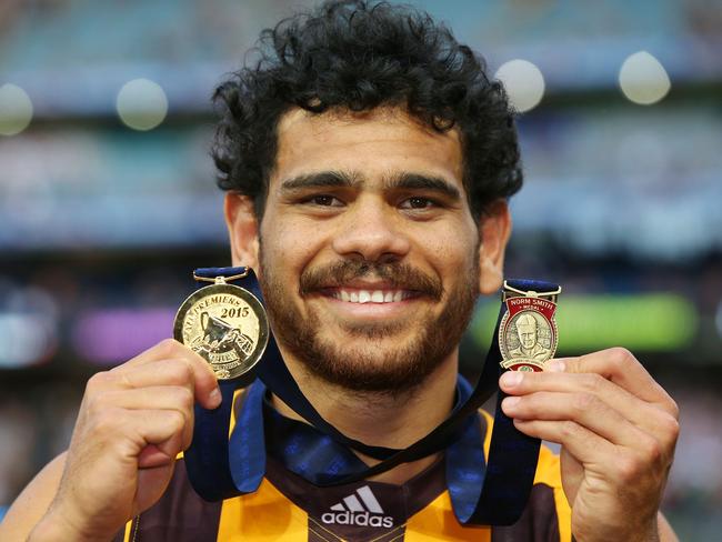 Cyril with his premiership and Norm Smith Medal in 2015. Photo: Michael Dodge/AFL Media/Getty Images