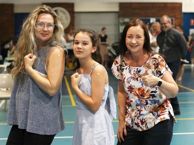 Shannon Soper and Zaiella Soper with Minister for Health Yvette D'Ath, after having the COVID-19 vaccination. Picture: Liam Kidston