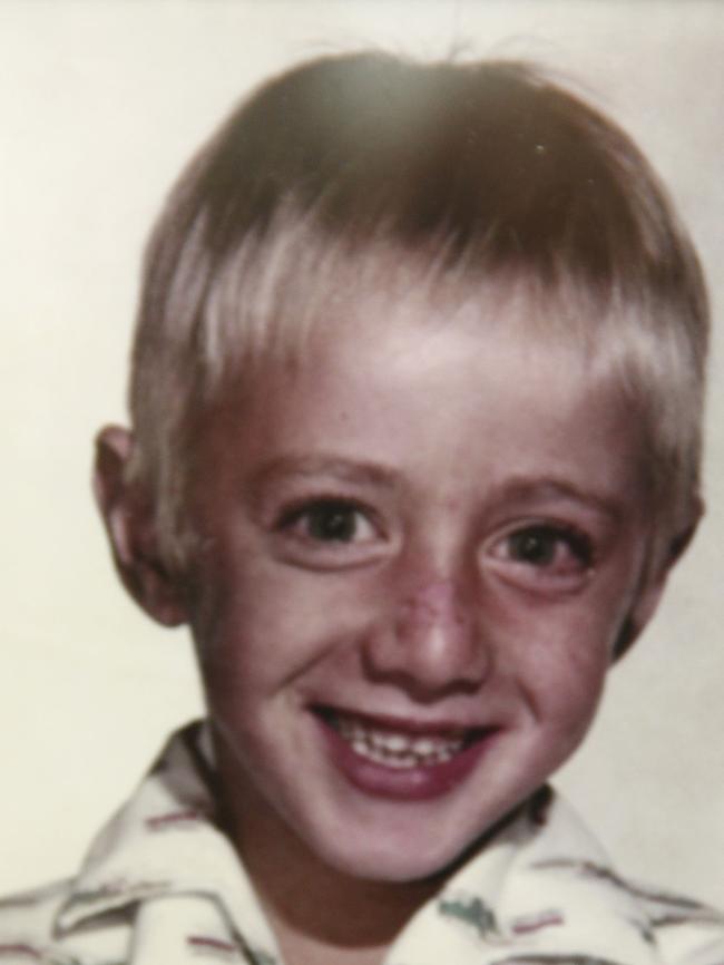 Peter Price, aged seven, in his favourite train shirt.