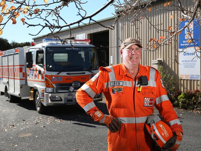 Allan Smeaton, SES member, Orbost, with his family, also members of SES, wife - Elizabeth, daughters - Rhiannon and Olivia (wheelchair), Picture Yuri Kouzmin