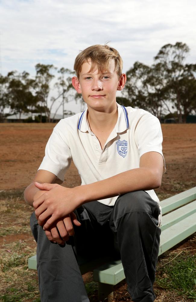 Student Dominic Vincent, 14, at the dry school oval. Picture: Jonathan Ng