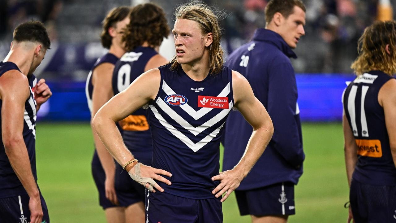 PERTH, AUSTRALIA - MARCH 25: Hayden Young of the Dockers looks dejected after the loss during the 2023 AFL Round 02 match between the Fremantle Dockers and the North Melbourne Kangaroos at Optus Stadium on March 25, 2023 in Perth, Australia. (Photo by Daniel Carson/AFL Photos via Getty Images)