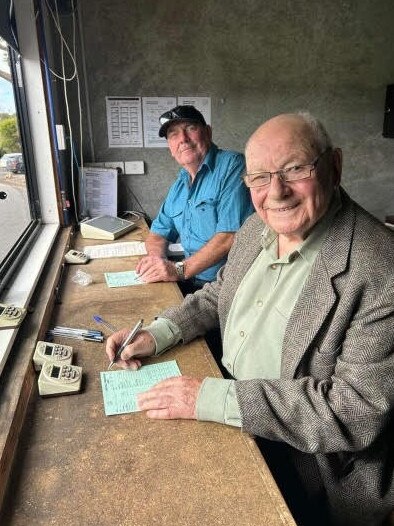 Jack Huxtable, right, has been Morwell's timekeeper for more than 20 years. He is pictured with Wonthaggi's Terry Hanley. Picture: Supplied