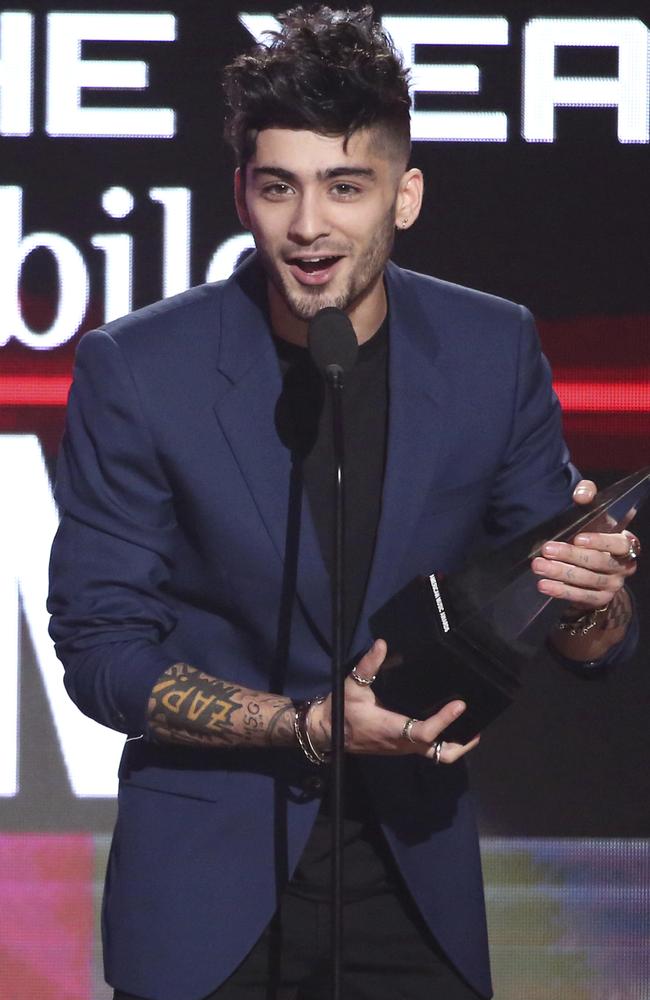 Zayn Malik accepts the award for new artist of the year at the 2016 American Music Awards. Picture; AP