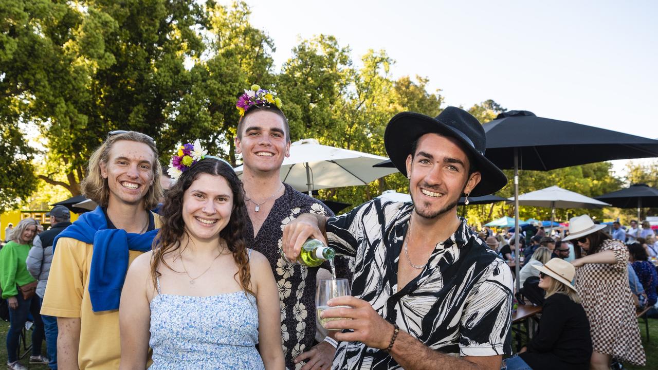 Enjoying the Festival of Food and Wine are (from left) Bryden Schultz, Rose Collier, Leo Hancock and Kahil Harwood, Carnival of Flowers 2022, Saturday, September 10, 2022. Picture: Kevin Farmer