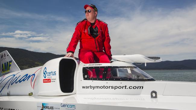 Dave Warby poses with his boat at Blowering Dam in the Snowy Mountains region of NSW.