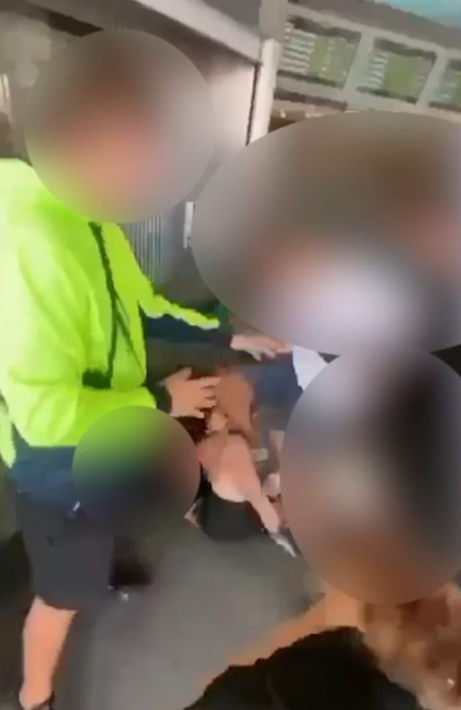 Still from shocking footage of a brutal bashing at a Gold Coast train station. Picture: Supplied