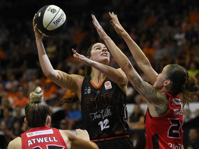 Townsville’s Alex Fowler of the Fire takes a shot against Perth in the WNBL. (Photo by Ian Hitchcock/Getty Images)