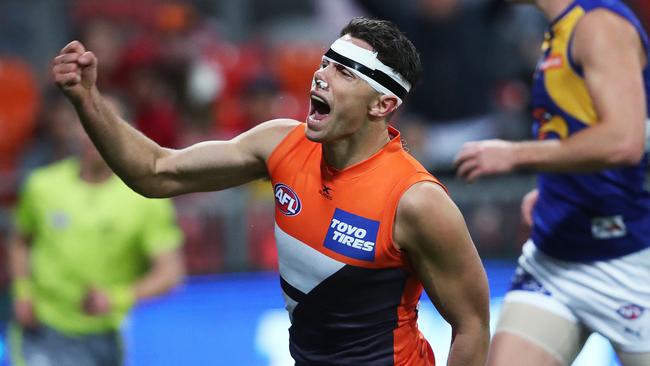 Giant Josh Kelly celebrates kicking the sealer against West Coast. Picture. Phil Hillyard