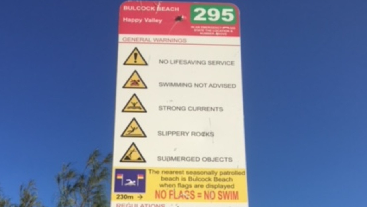 A warning sign at the beach in Caloundra.