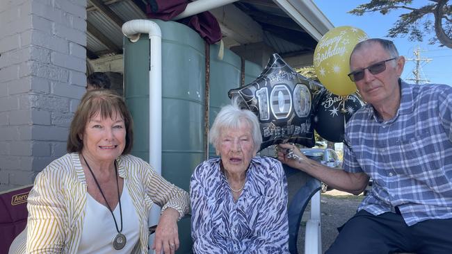 Lyn Wilson and Ken Nation celebrate their mother Eileen Nation's 100th birthday in St Leonards on Saturday. Photo: Mark Murray.