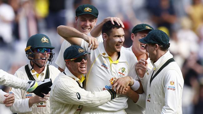 Scott Boland celebrates with teammates after taking another wicket during the Test match between Australia and England at the MCG last December. Picture: Daniel Pockett/Cricket Australia via Getty Images