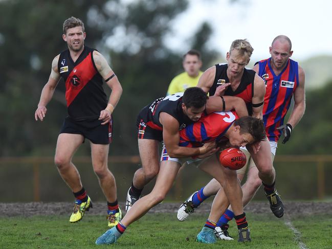 Nepean football league: Frankston Bombers v Rye at Baxter Park. Bombers #8 Sam Fox tackles Rye #6 Harry Whitty. Picture: Chris Eastman