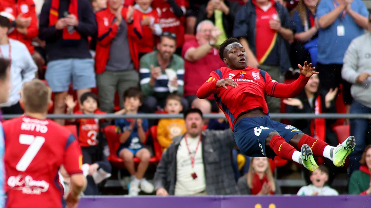 Nestory Irankunda of Adelaide United celebrates after scoring a goal during an A-League Men round two match. (Photo by Kelly Barnes/Getty Images)